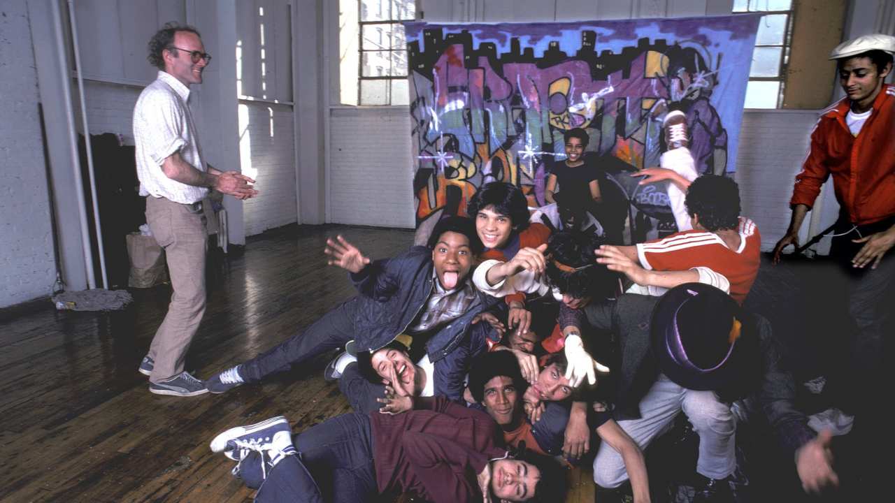 a group of teens posing for a photo